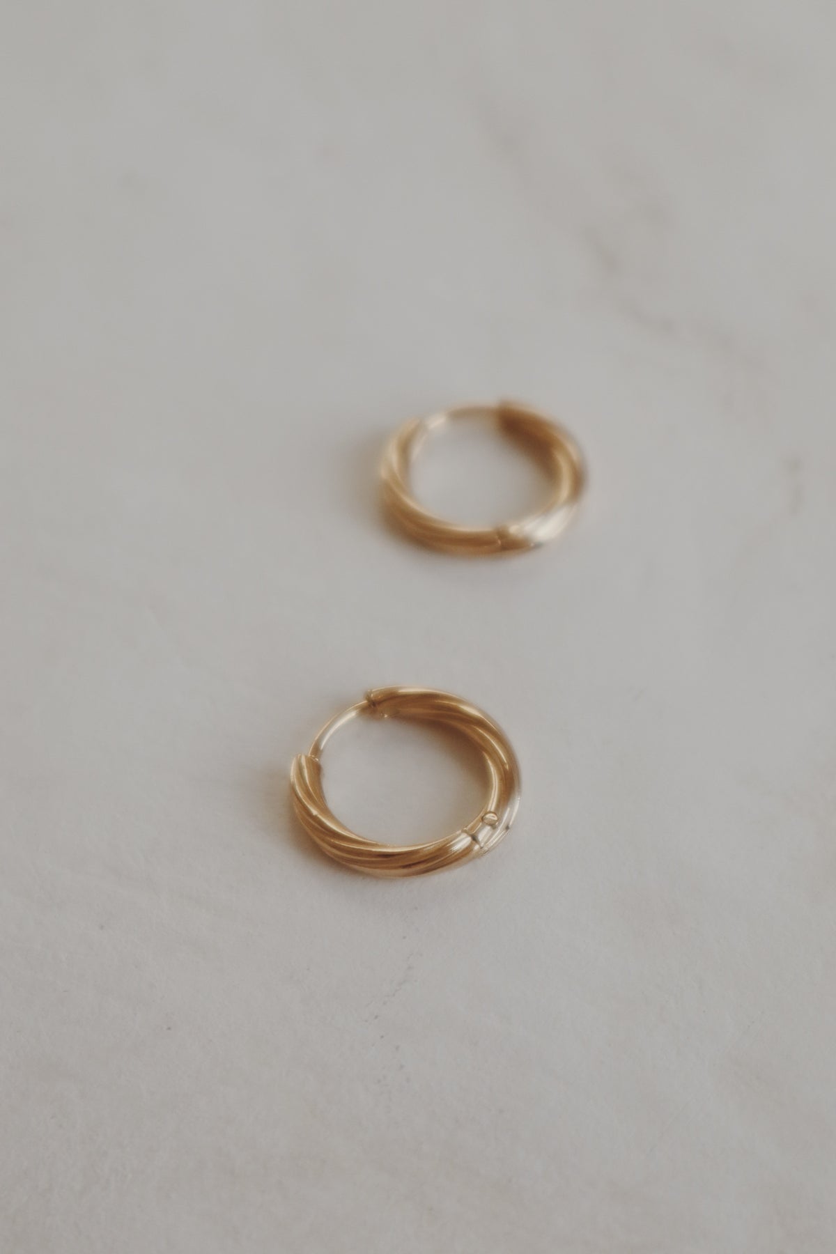 Elle Twist Huggie Hoop Earrings