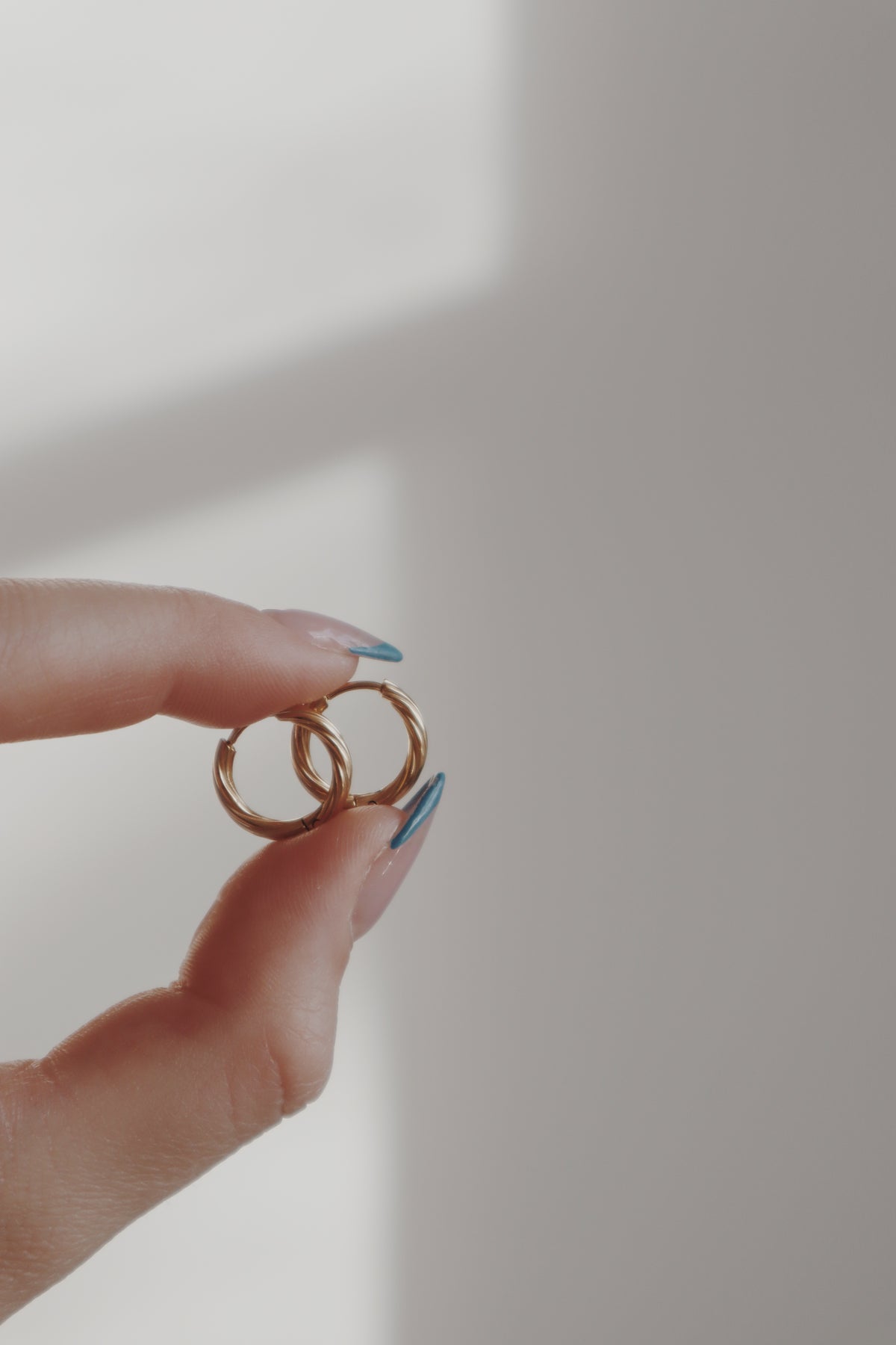 Elle Twist Huggie Hoop Earrings