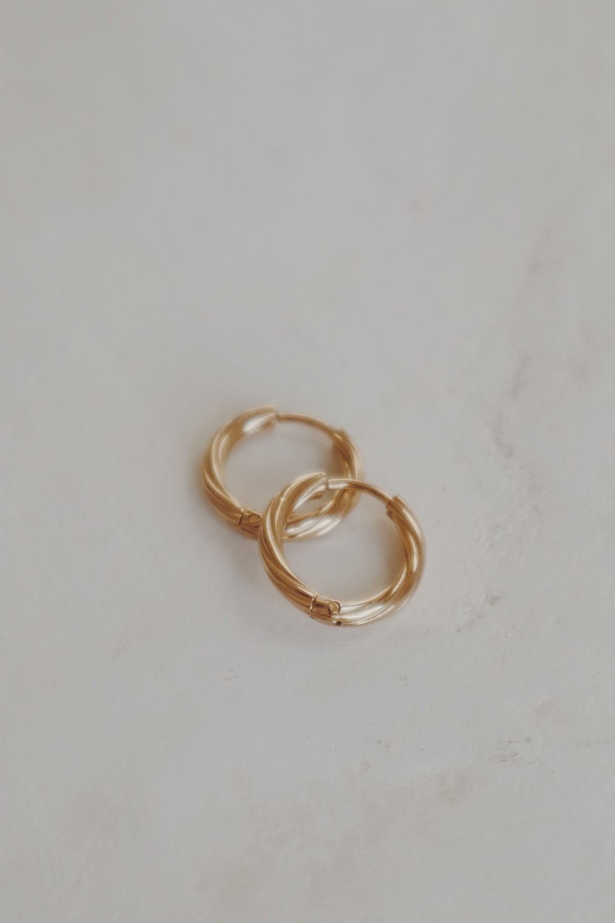 Elle Twist Huggie Hoop Earrings