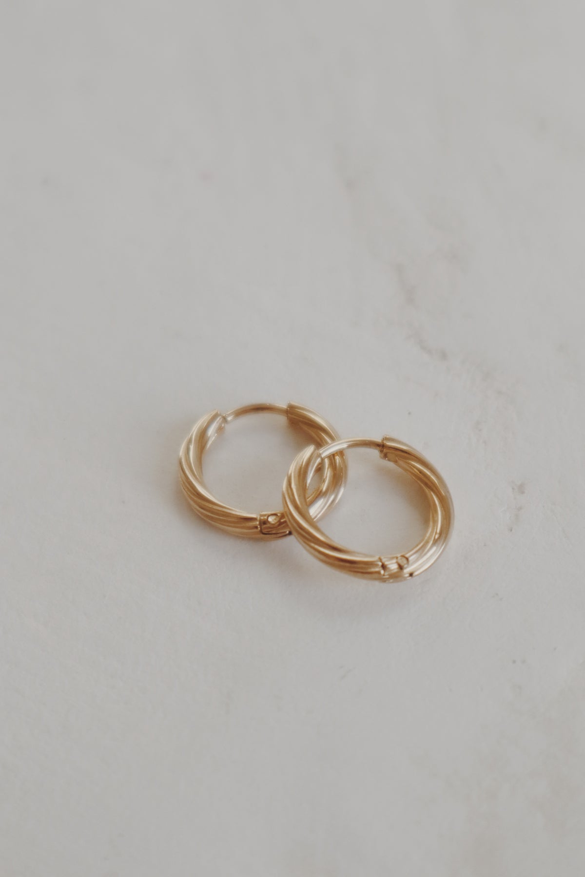 Elle Twist Huggie Hoop Earrings