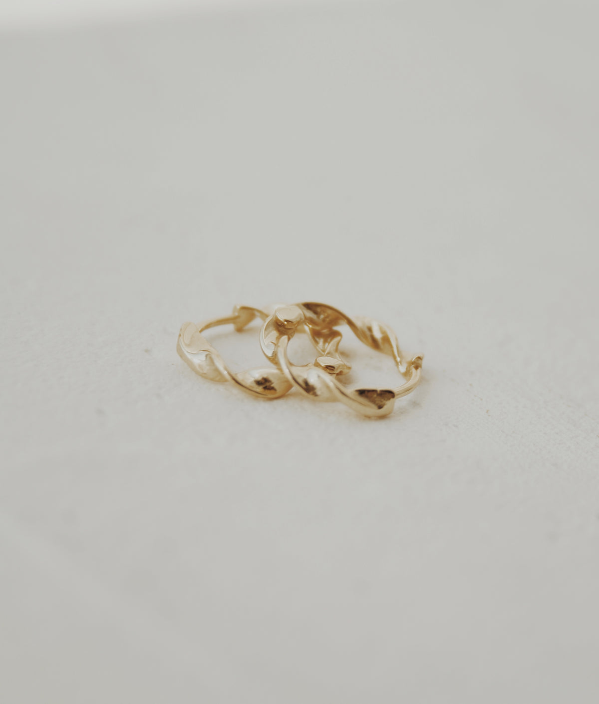 Dainty Twist Huggie Hoops