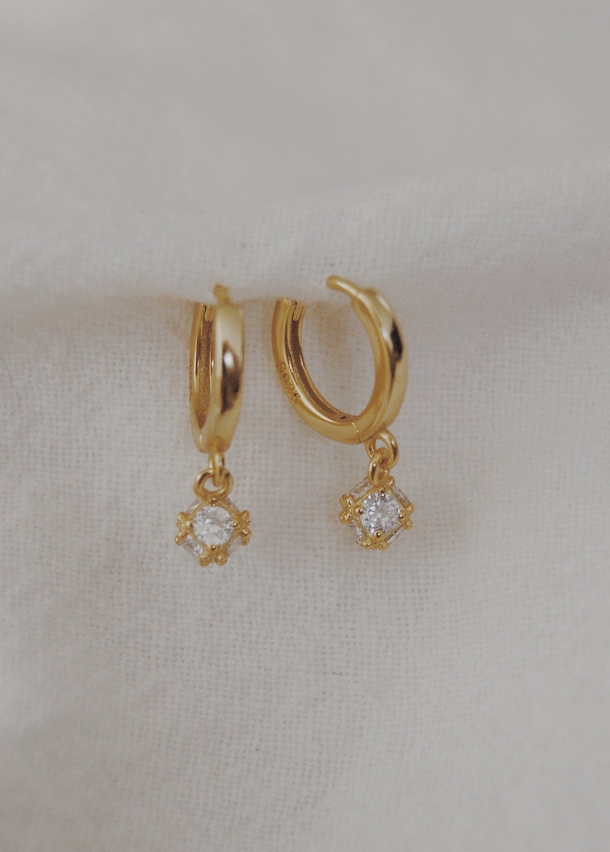 Dropping the Ball Huggie Hoop Earrings