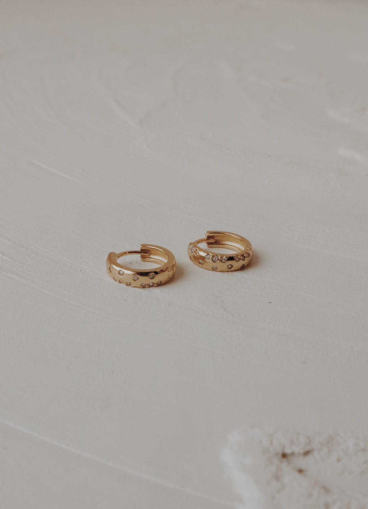 Becca Huggie Hoop Earrings