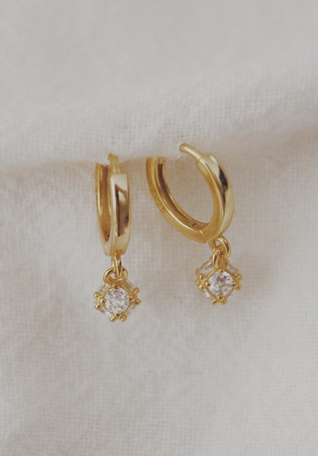 Dropping the Ball Huggie Hoop Earrings
