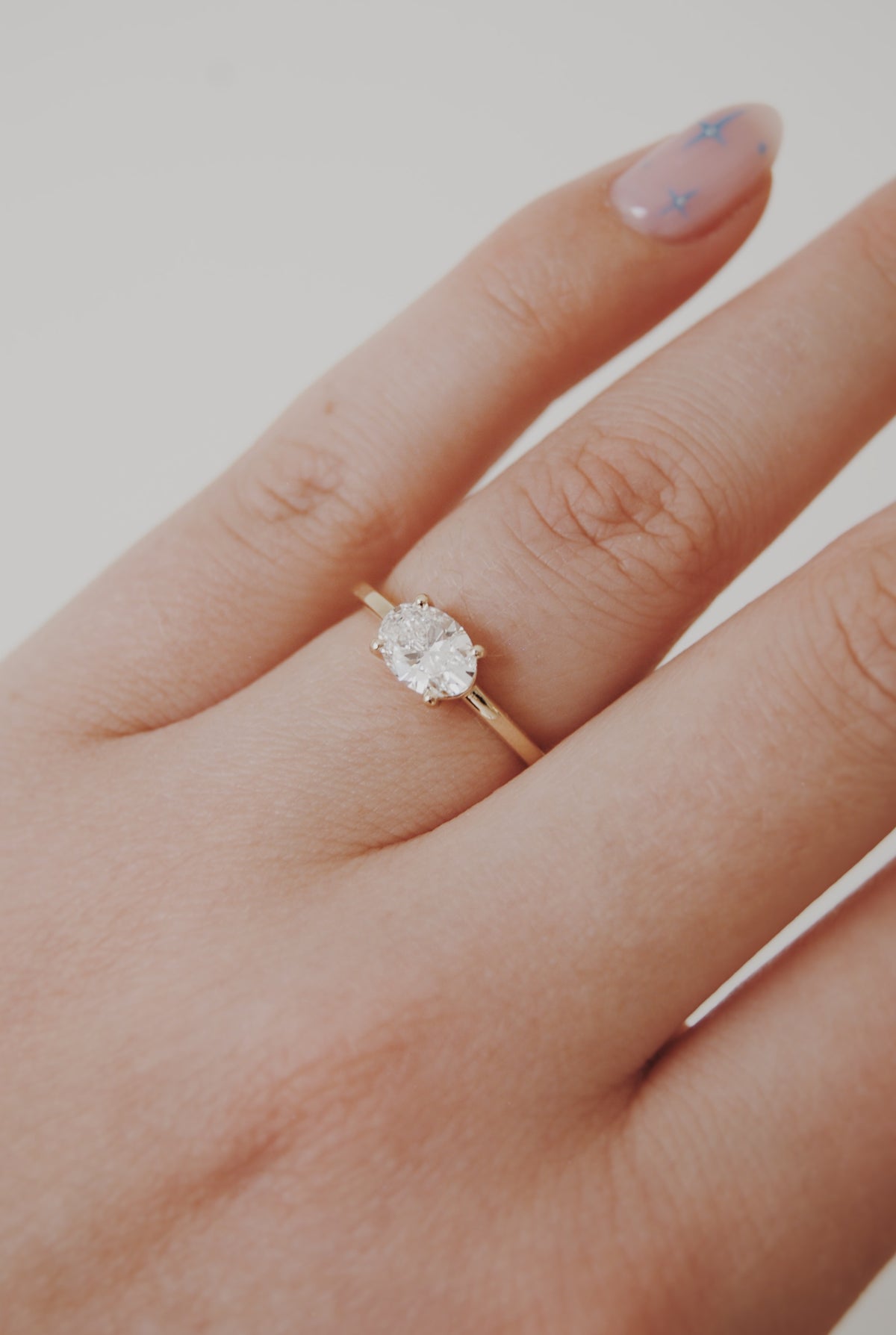 Quin East West Oval Solitaire Engagement Ring