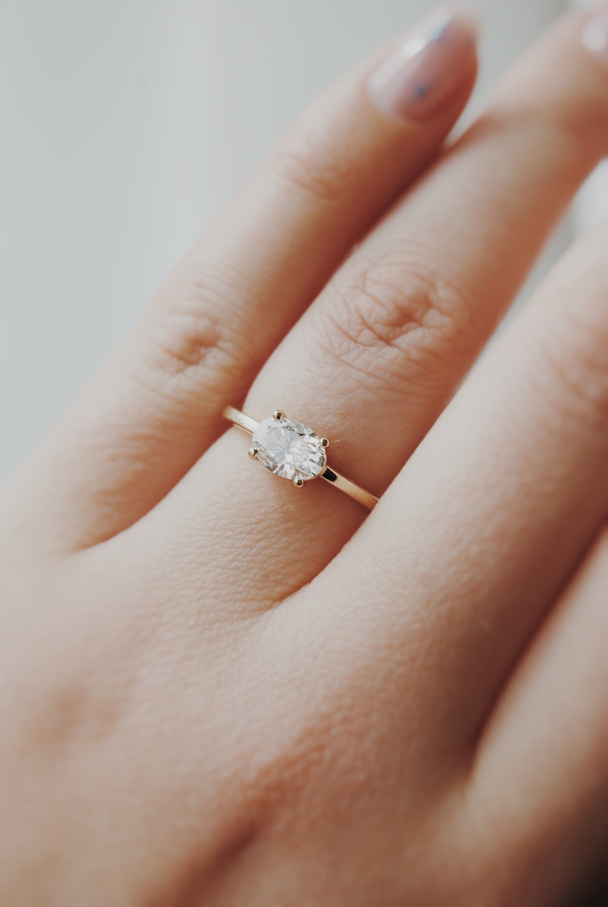 Quin East West Oval Solitaire Engagement Ring