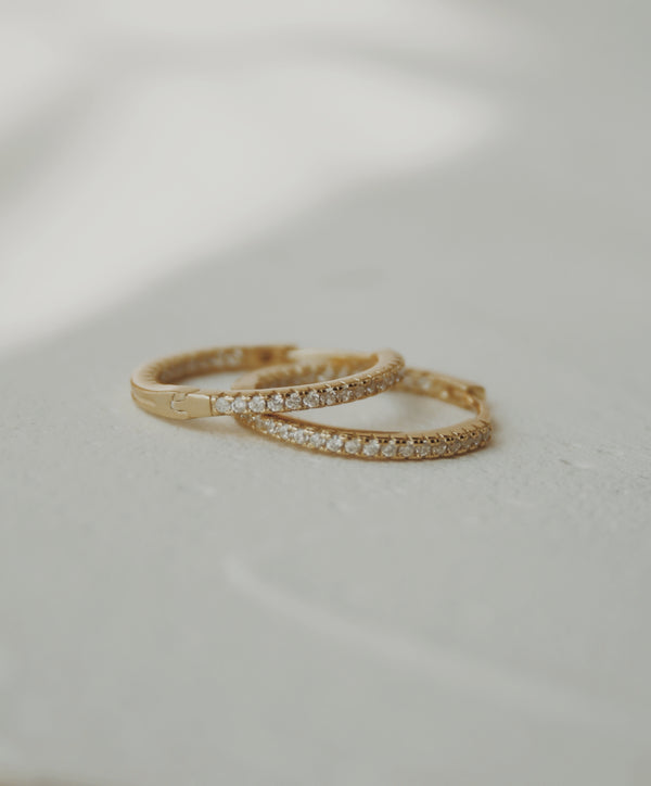 Nyla Huggie Hoop Earrings in Clear
